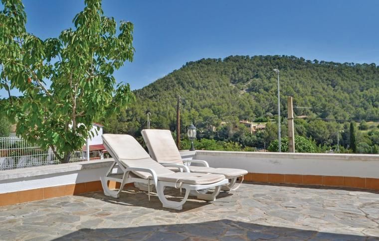 Utsikt mot natur från boende i Sitges
